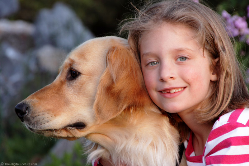 Girl Hugging Dog